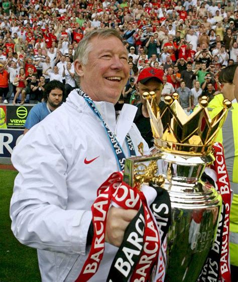 Sir Alex Ferguson Celebrates With The Premier League Championship