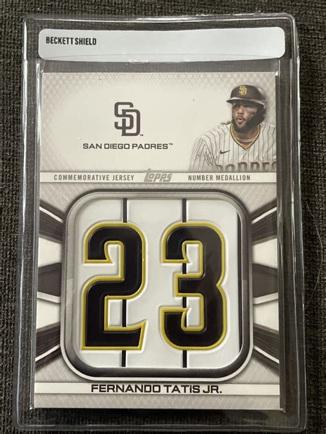 Fernando Tatis Jr 2022 Topps Series 1 Jersey Number Medallion Relic