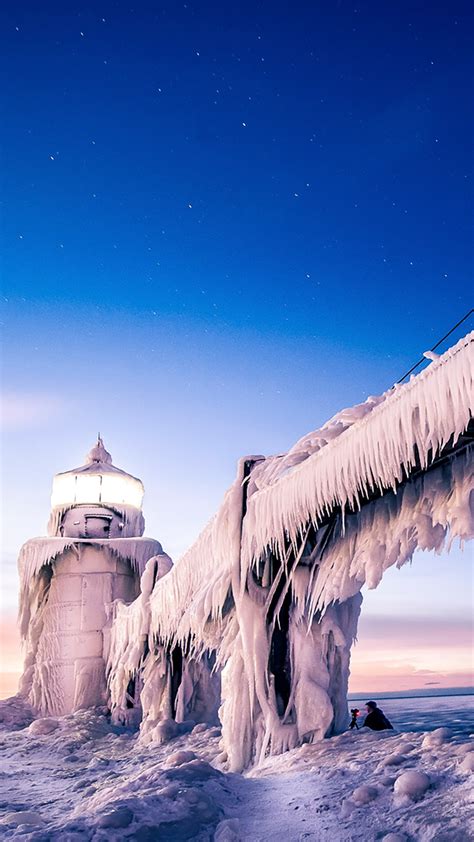 Ice Covered St Joseph North Pier Lighthouse In Winter Michigan Usa