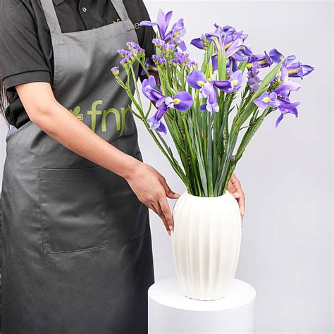 Online IRIS Flowers Arrangement in Premium Vase Gift Delivery in UAE - FNP