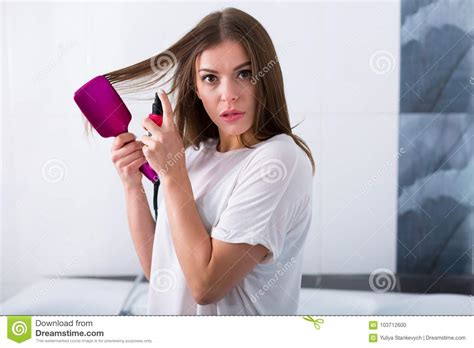 Woman With A Hot Straightening Brush Stock Photo Image Of Haircare