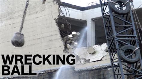 Wrecking Ball In Action Demolishing A Concrete Building Wrecking Ball