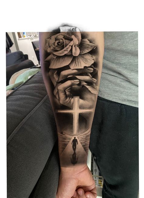 Christian Sleeve Tattoo With Cross And Flowers