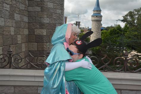 hugging  fairy godmother wdwmagic unofficial walt disney world
