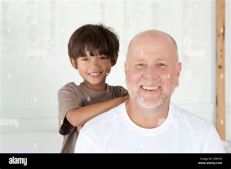 Father And Son Smiling Together Stock Photo Alamy