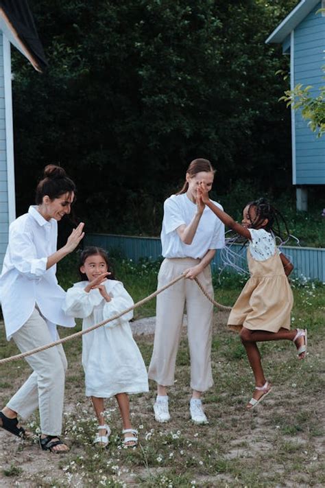 Girls Playing Tug Of War Together · Free Stock Photo