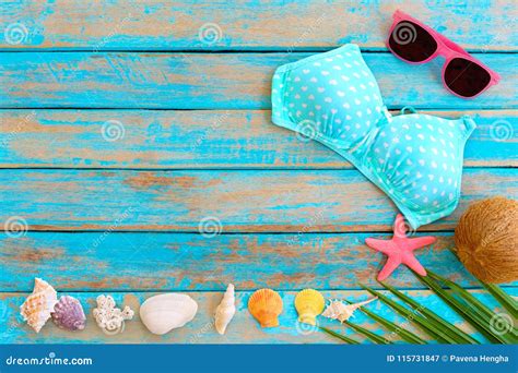 Summer Background With Bikini Sunglasses Coconut Starfish Coral And