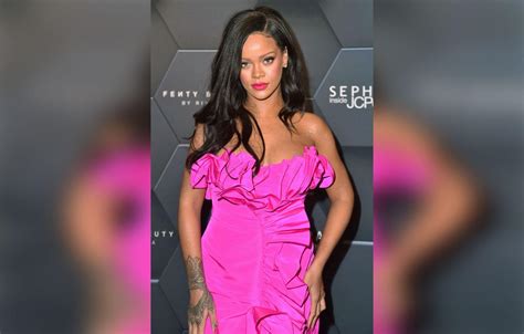 Rihanna Claps Back After Internet Troll Shades Her Forehead