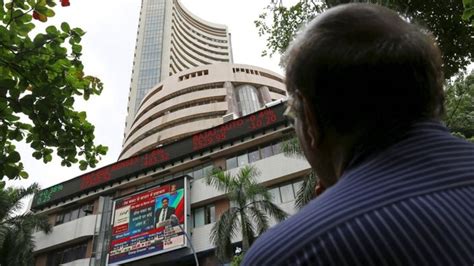 Sensex Tumbles Over 900 Points To Settle At 59 745 Nifty In Red At