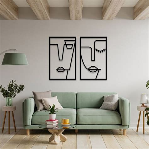 Conjunto de decoración de pared de caras cúbicas doradas de 2 arte de