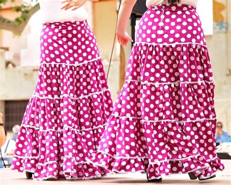 Premium Photo A Couple Of Flamenco Dancers In Pink Polka Dots Skirts