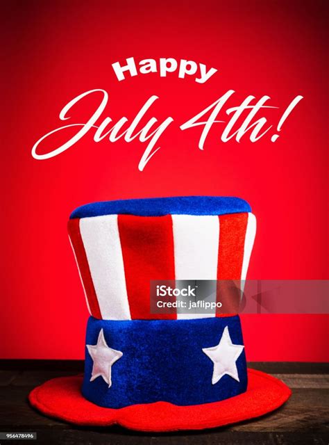 Uncle Sam Hat On Red Background With Happy July 4th Greeting Stock