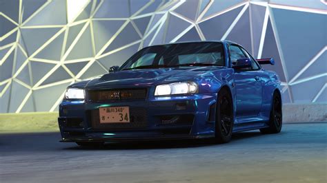 Download Customized Blue Nissan Skyline Gtr R34 Wallpaper | Wallpapers.com