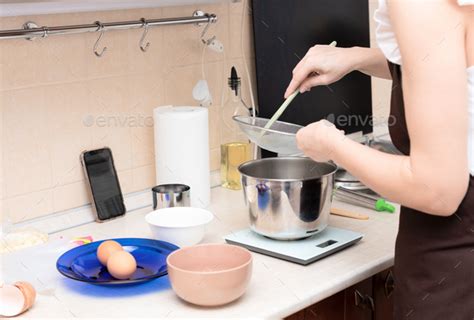 Woman Whipping Egg Whites In Bowl Making Homemade Meringue Cake Pavlova By Online Recipe From