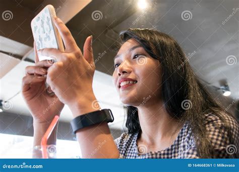 Woman Looking Into Her Mobile Phone Stock Image Image Of Lifestyle