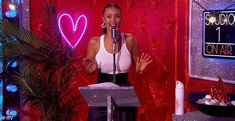 Maya Jama Puts On A Busty Display In A Plunging White Vest And Skintight Trousers While