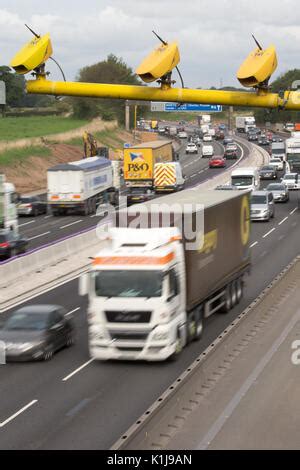 Average speed cameras on the M6 motorway in Cheshire,UK Stock Photo - Alamy