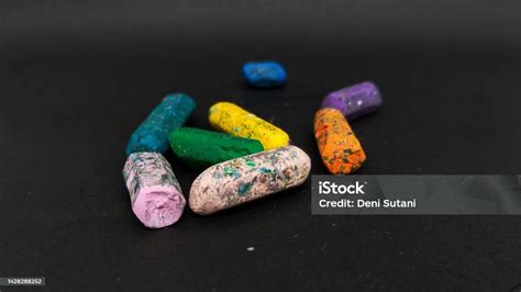 Broken Crayon On Black Background Stock Photo Download Image Now