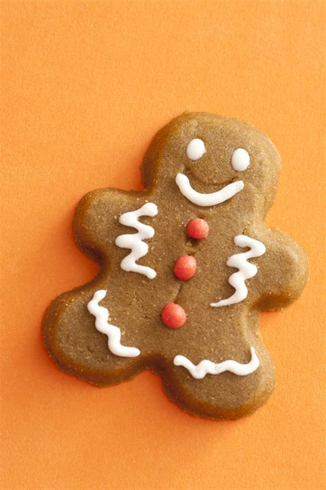 Gingerbread Cookie On A Festive Orange Background Free Stock Image