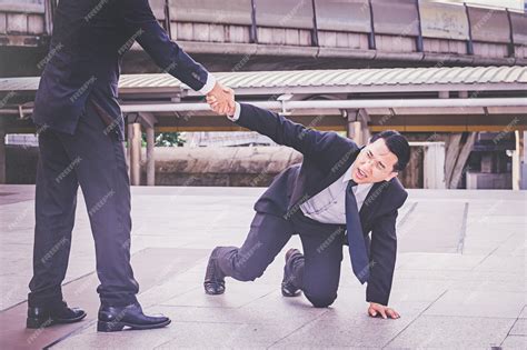 Premium Photo Businessman Helping Hand In Business Concept