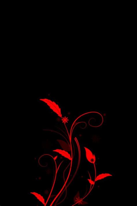 a red flower on a black background