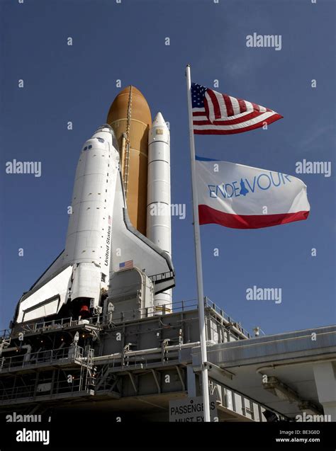 At Nasas Kennedy Space Center In Florida Flags Swing In The Breeze As