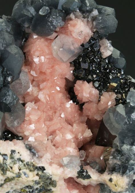 Geology Rhodochrosite With Calcite On Sphalerite