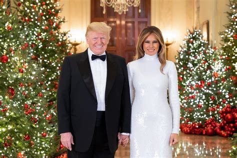 Donald Trump, Melania hold hands in official Christmas portrait