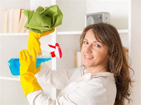 Beautiful Young Woman Cleaning Her House Stock Photo By ©amaviael 40300305