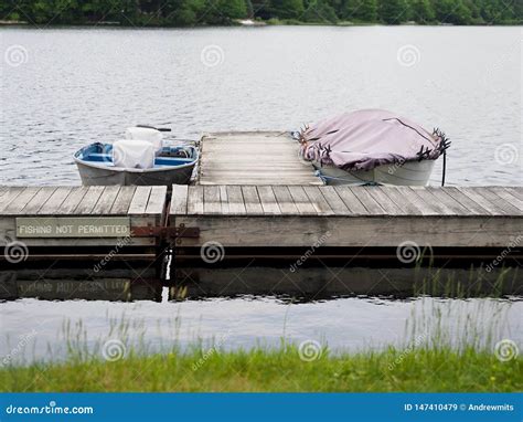 Covered Boats Tied To Lake Dock Stock Image - Image of tied, outdoor ...