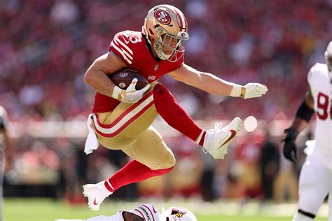 McCaffrey makes history, Purdy delivers as 49ers dominate Cardinals to ...