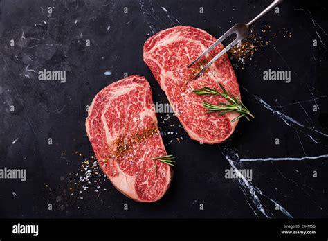 Two Raw Fresh Marbled Meat Black Angus Steak Ribeye Seasonings And