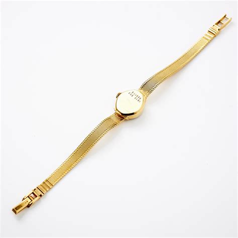 CERTINA armbandsur integrerad länk 18 k guld manuell 1960 tal