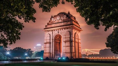 Premium Photo | The india gate and the canopy night illuminated view ...