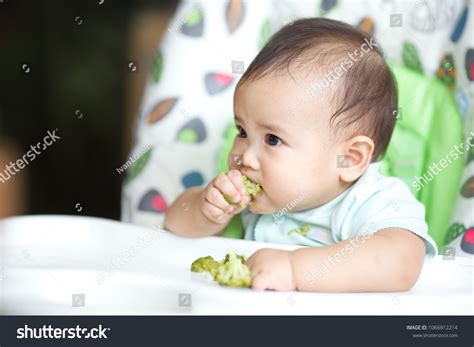 indonesian baby eat   images pictures shutterstock