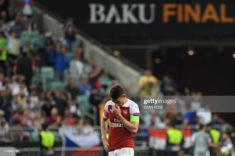 Topshot Arsenals French Defender Laurent Koscielny Reacts After