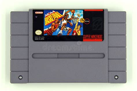 Cartucho De Jogo Super De Nintendo Do Basquetebol Do NCAA Imagem De