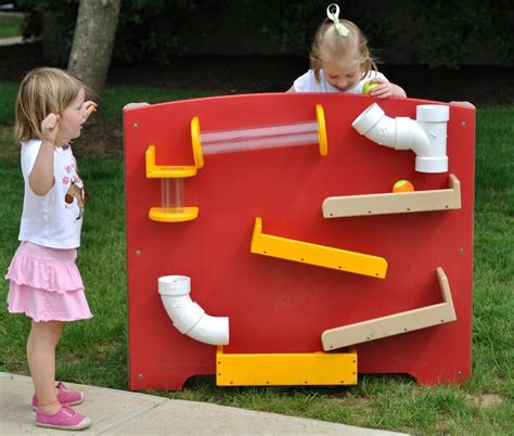 Outside magnetic board- move around the items and drop a ball....LOVE ...