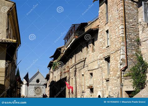 Historic Via San Francesco In Assisi Leading To The Famous Basilica