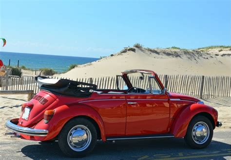 Location Volkswagen Coccinelle 1974 Rouge 1974 Rouge BASSUSSARRY