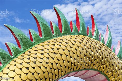 Golden Chinese Dragon Body On Blue Sky Background Stock Photo