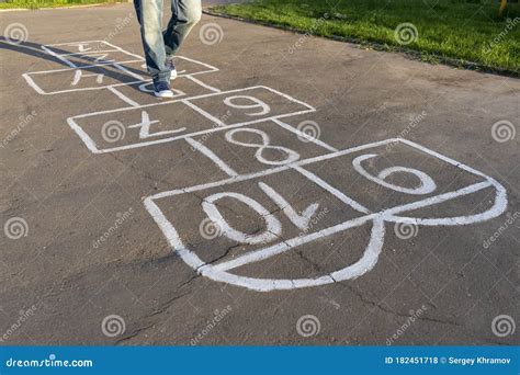 A Man Plays Hopscotch On The Street Stock Photo Image Of School