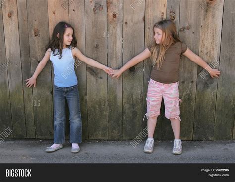 Best Friends Holding Hands Stock Photo & Stock Images | Bigstock