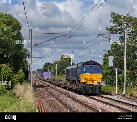 Direct Rail Services Class 66 Locomotive On The West Coast Mainline With A Grangemouth To