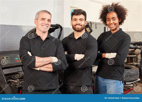 Proud Mechatronics Team With African Woman Stock Photo Image Of