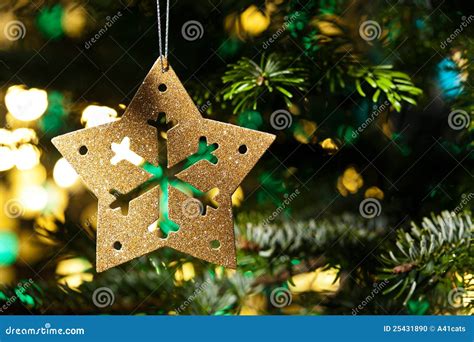 Decorative Gold Star Ornament In A Christmas Tree Stock Photo Image