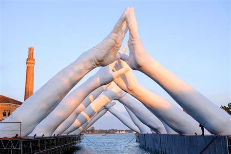 Building Bridges Giant Hands Reaching Across Venice Canal Are A Symbol Of Unity