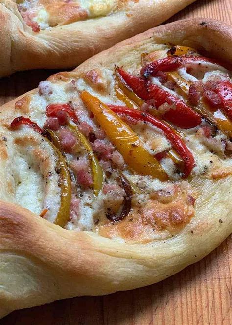 Peinirli Greek Pizza Boats With Colorful Peppers And Pancetta Cubetti