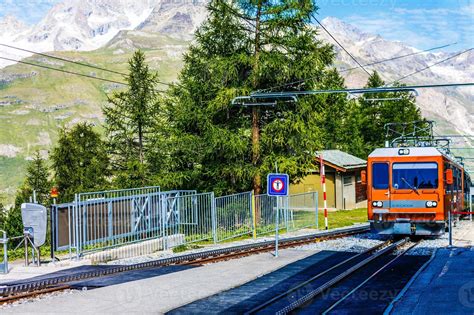 train in the mountains of switzerland 16783018 Stock Photo at Vecteezy