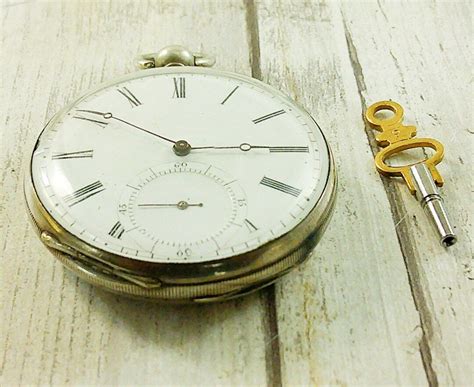 Non Working Antique Pocket Watch Marked Olivier Quartier Starts And